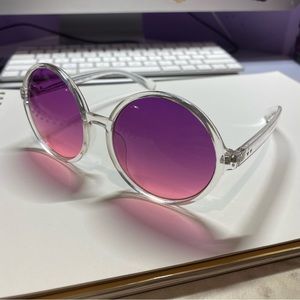 Round pink and purple gradient sunglasses.